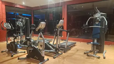 a gym with several exercise bikes in a room at Appartement impeccable en plein de centre ville in Marrakech