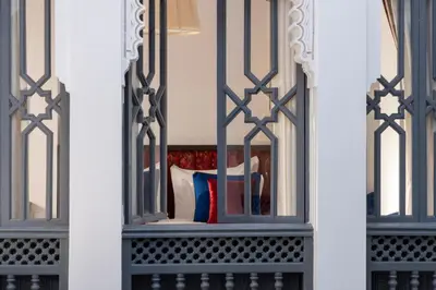 a view of a bed through a window at Riad Laz Mouassine & Wellness in Marrakech