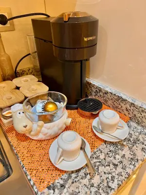 a kitchen counter with an egg in a bowl and a coffee maker at Pearl Garden Studio Cosy Lux Elegant Sunny Terrace Piscine in Marrakech