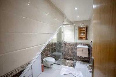 a bathroom with a shower and a toilet and a sink at Appartement cosy au cœur de Semlalia in Marrakech