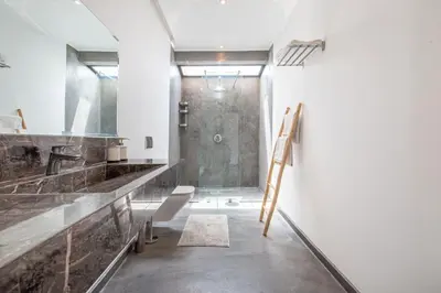 a bathroom with a shower and a sink at Villa Relax in Marrakech