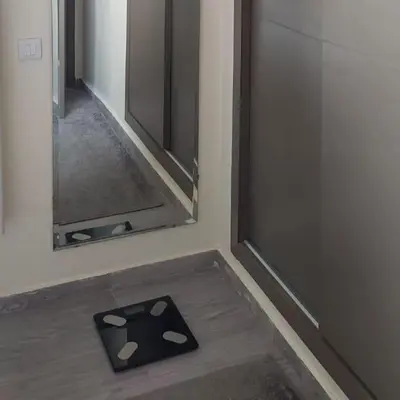 a mirror and a mat on the floor in a room at Marrakech Apart Macdonald Rte safi 10 min gueliz in Marrakech