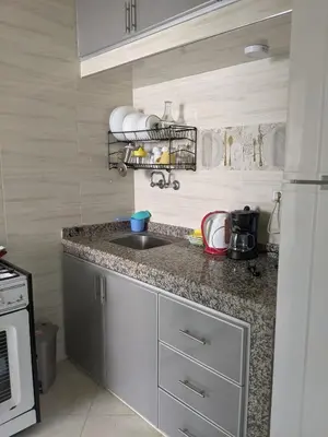 a kitchen with a sink and a counter top at Marrakech apartment in Marrakech