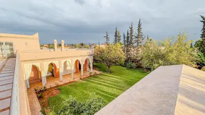 an aerial view of a house with a yard at Villa des Rêves in Marrakech