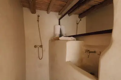 a bathroom with a shower and a sink and a mirror at Riad Haloma 90m2 in der Medina mit Terrasse in Marrakech
