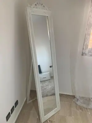 a mirror in the corner of a room at Luxury Appartement with Pool in Marrakech