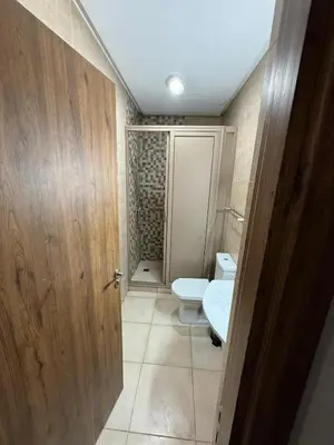 a bathroom with a toilet and a sink at Appartement Nour 5 Marrakech in Marrakech