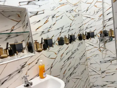 a bathroom with a sink and a mirror at M-S Riad in Marrakech
