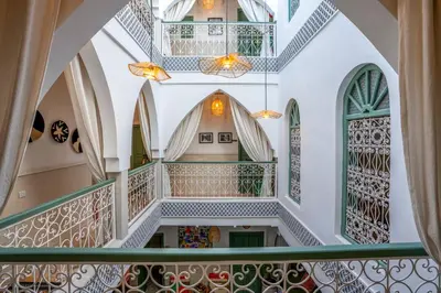 an internal view of a building with stairs and windows at Yacouta Riad and Spa in Marrakech