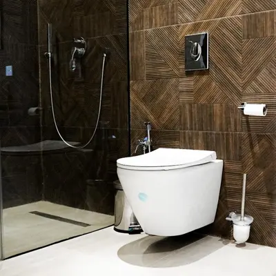 a bathroom with a toilet and a shower at VILLA Atlas in Sraghna