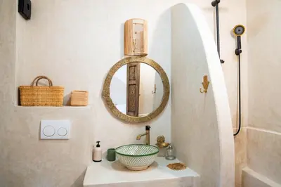 a bathroom with a sink and a mirror at Riad Eden Dorient in Marrakech