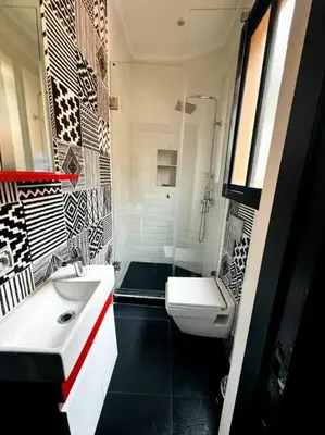 a bathroom with a sink and a toilet and a shower at Les Jardin d'Atlas golf and Waky with private Pool in Marrakech