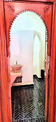 an open door to a room with a bowl on a table at Riad Babmoon - Private Riad with Pool & Rooftop in Marrakech