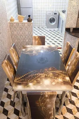 a table and chairs with lights on it at appartement au cœur du Madina in Marrakech