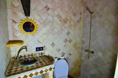 a bathroom with a sink and a toilet at Riad marrakesh peace in Marrakech