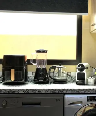 a kitchen counter with a blender on a counter top at Hosted by Zakia in Marrakech