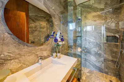 a bathroom with a sink and a shower at Villa Talia, Luxury Stay, Golf & Lake View in Marrakech