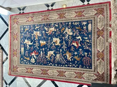 a tapestry hanging on a wall at Appart 2 chambres luxe contemporain hivernage in Marrakech