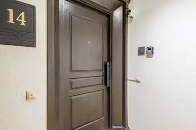 a door in a room with the number on it at Amazing apartment in the heart of Marrakesh in Marrakech