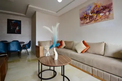 a living room with a couch and a table at apart in the centre of marrakech gueliz in Marrakech