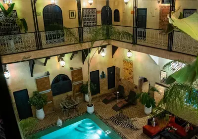 an overhead view of a building with a swimming pool at Riad Romance in Marrakech