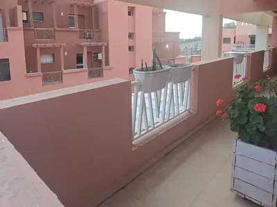 a balcony of a building with plants on it at Rita 83 in Marrakech