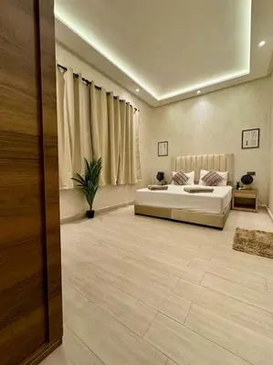 a bedroom with a large bed in a room at Yumo - La Vida in Marrakech