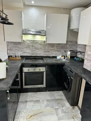 a kitchen with a stove and a sink at Heart of Marrakech city center - Gueliz in Marrakech