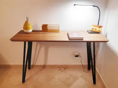 a wooden table with a lamp on top of it at Super cosy fully equip - pool - prox. M Avenue in Marrakech