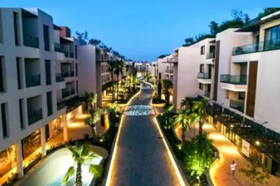 an empty street in a city with buildings at Super cosy fully equip - pool - prox. M Avenue in Marrakech