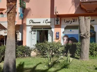 a building with a sign on the front of it at Super cosy fully equip - pool - prox. M Avenue in Marrakech