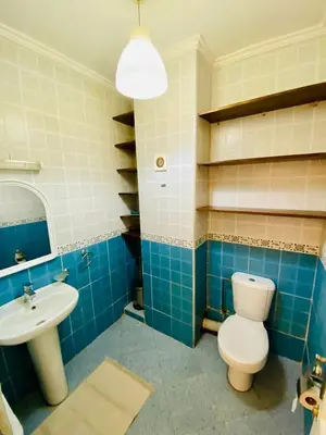 a bathroom with a toilet and a sink at Appart Moderne Calme & Climatisé in Marrakech