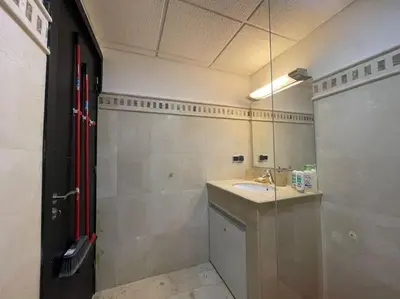 a bathroom with a sink and a mirror at La maison Majorelle de Marrakech in Marrakech