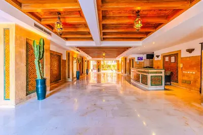 a large room with a tile floor and wooden ceilings at 17 - Top Location, NEUF, piscine & Comfort in Marrakech