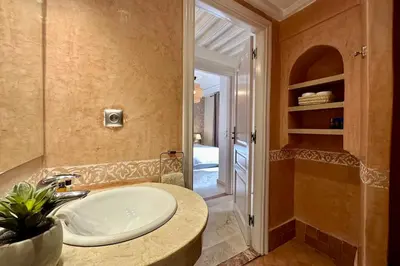 a bathroom with a sink and a shower at Apartment in Centre of Marrakech in Marrakech