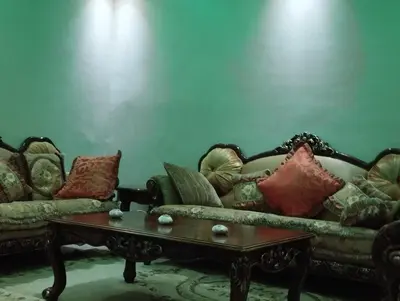 a living room with two couches and a coffee table at Tout est Nouveau et Propre,au Centre marrakech in Marrakech
