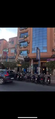 a group of motorcycles parked in front of a building at Un rêve à Marrakech in Marrakech