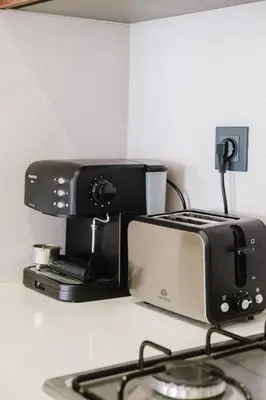 a toaster oven sitting on top of a counter at Stylish and Central Downtown Retreat in Marrakech