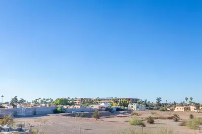 a view of a city with buildings in the distance at Dar KAJAM -Privatized Riad -10mn from Jamaa Al Fna in Marrakech