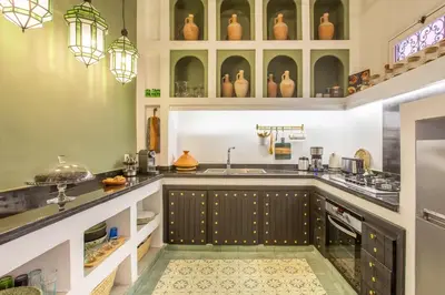 a kitchen with a sink and a counter at Dar KAJAM -Privatized Riad -10mn from Jamaa Al Fna in Marrakech