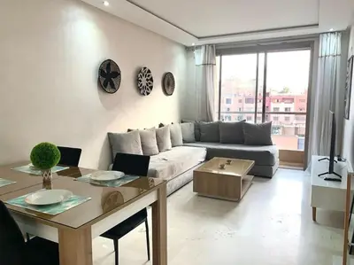 a living room with a couch and a table at 2-Bedroom Apart, Heart of Gueliz in Marrakech