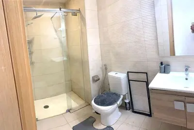 a bathroom with a shower and a toilet and a sink at 2-Bedroom Apart, Heart of Gueliz in Marrakech