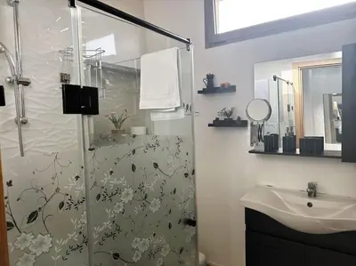 a bathroom with a shower and a sink at Maison du Bonheur à Marrakech in Marrakech