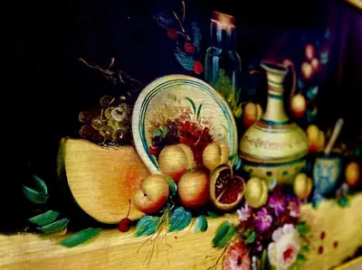 a painting of fruits on a table with a bottle at Maison du Bonheur à Marrakech in Marrakech