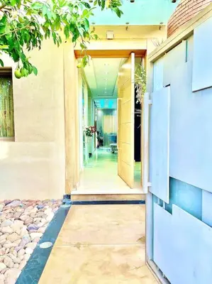 an open door of a house with a hallway at Maison du Bonheur à Marrakech in Marrakech