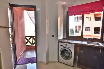 a laundry room with a washing machine and a window at Amazing view, apartment in Marrakech in Marrakech