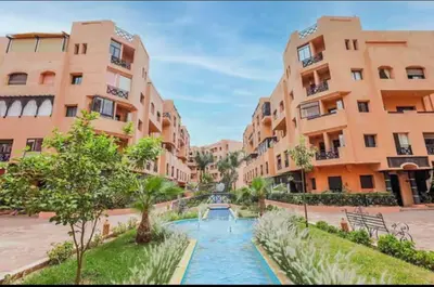 a view of a street with buildings and a river at appartement Nizar in Marrakech