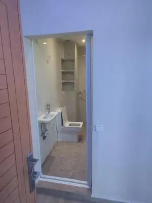 a bathroom with a sink and a toilet in it at Appartement au centre Marrakech in Marrakech