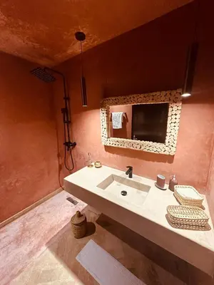a bathroom with a sink and a mirror at Dar Celya Sfia in Marrakech