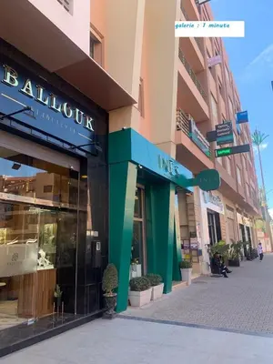 a store front of a building on a street at Tulipe Family House-Pool and Parking in Marrakech